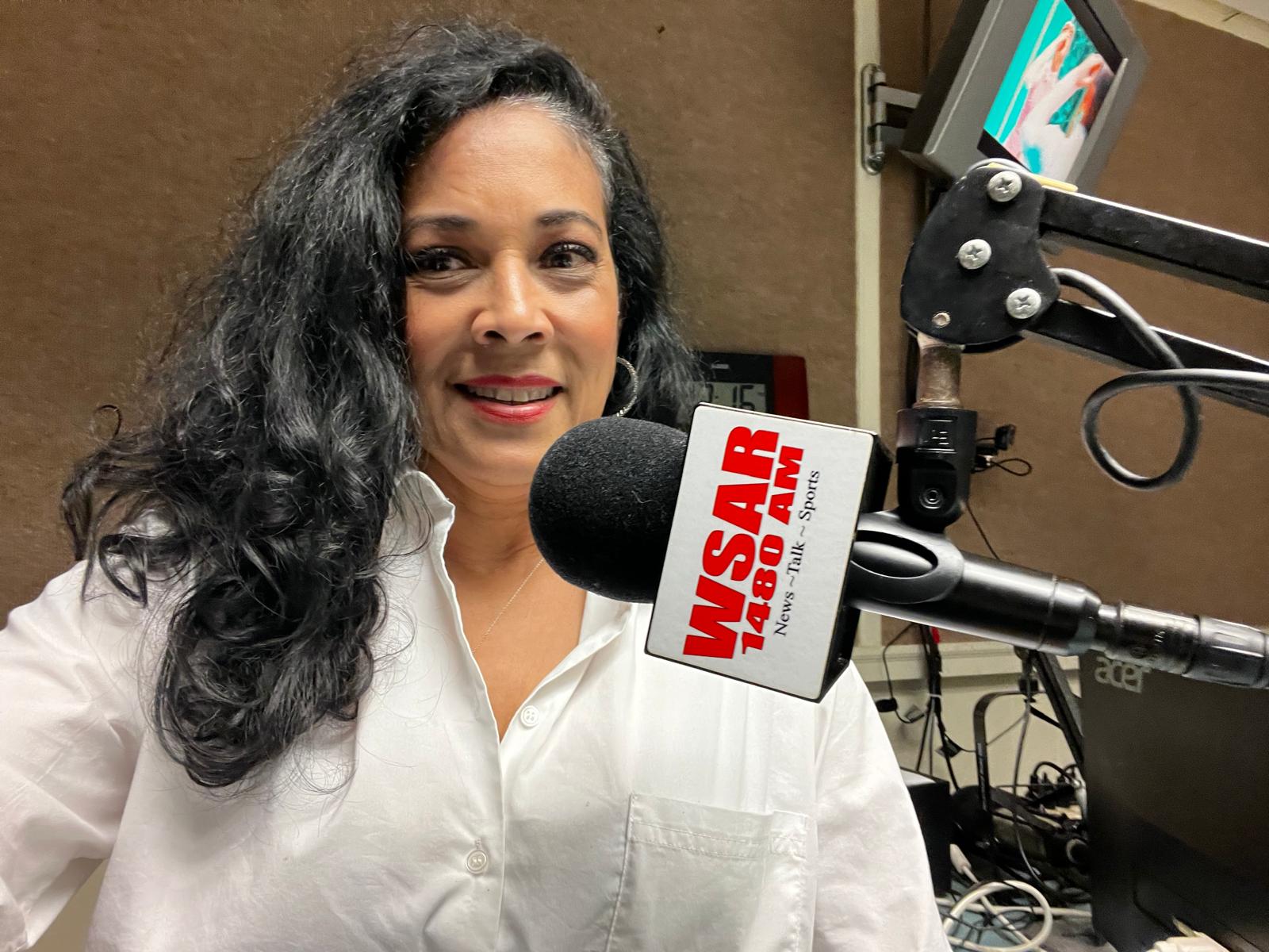 Judith during a radio interview